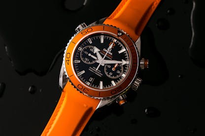 Omega Seamaster Professional diver watch with rotating bezel and wave dial