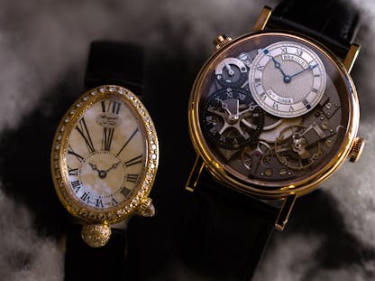 Historic Breguet wristwatches, including the Reine de Naples and a skeleton dial timepiece.