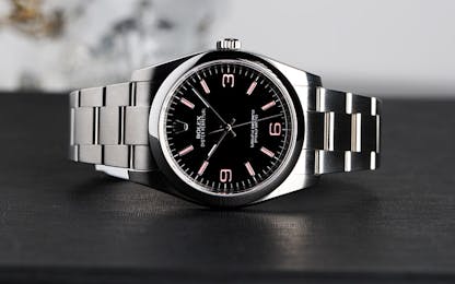 Rolex Oyster Perpetual 116000 with a black dial