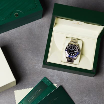 Rolex GMT-Master II in green box with warranty card