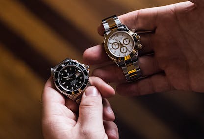 Comparing Rolex Submariner and Daytona in hand