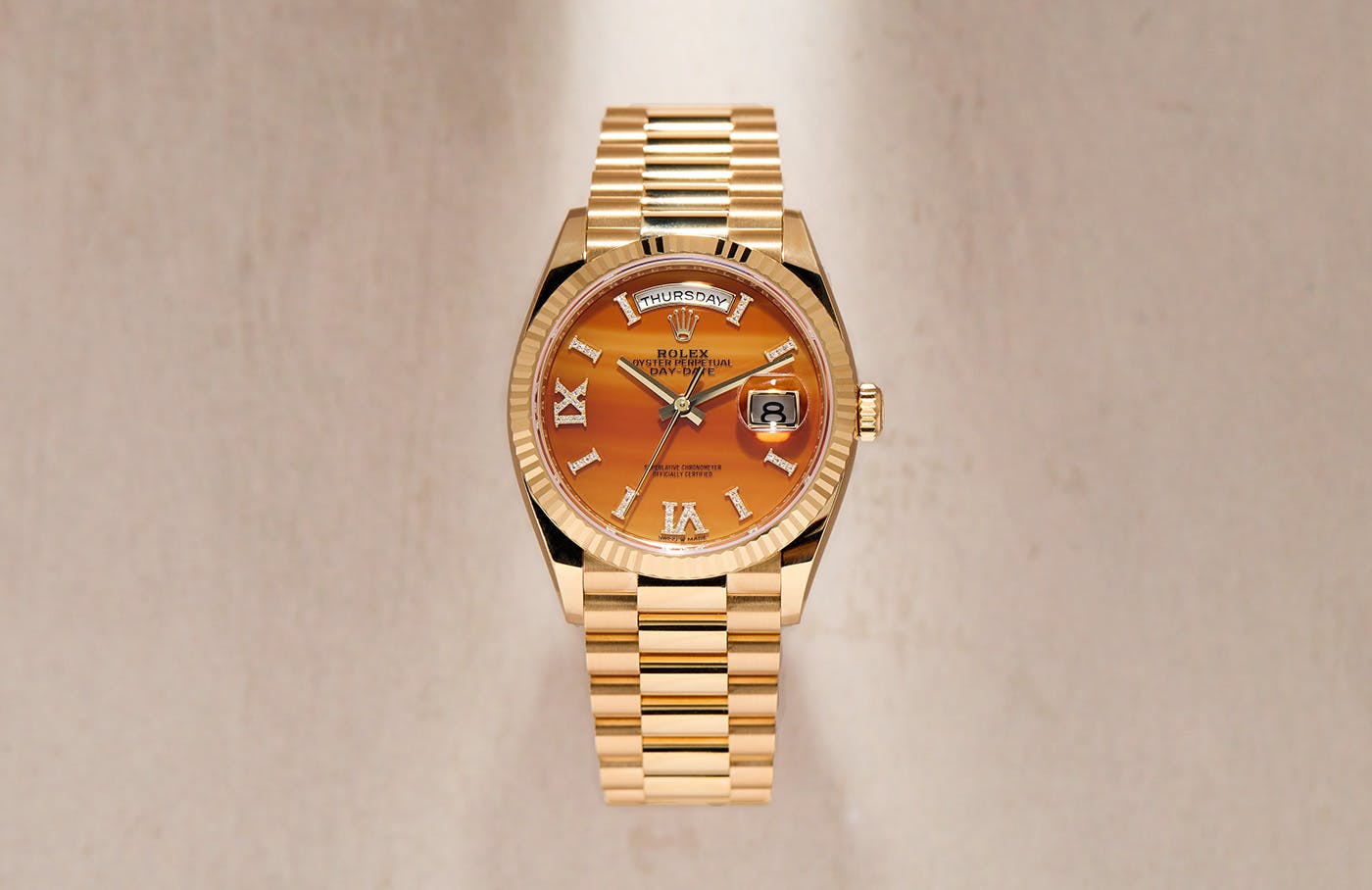 A Rolex Day Date In Yellow Gold With Carnelian Dial WatchBox