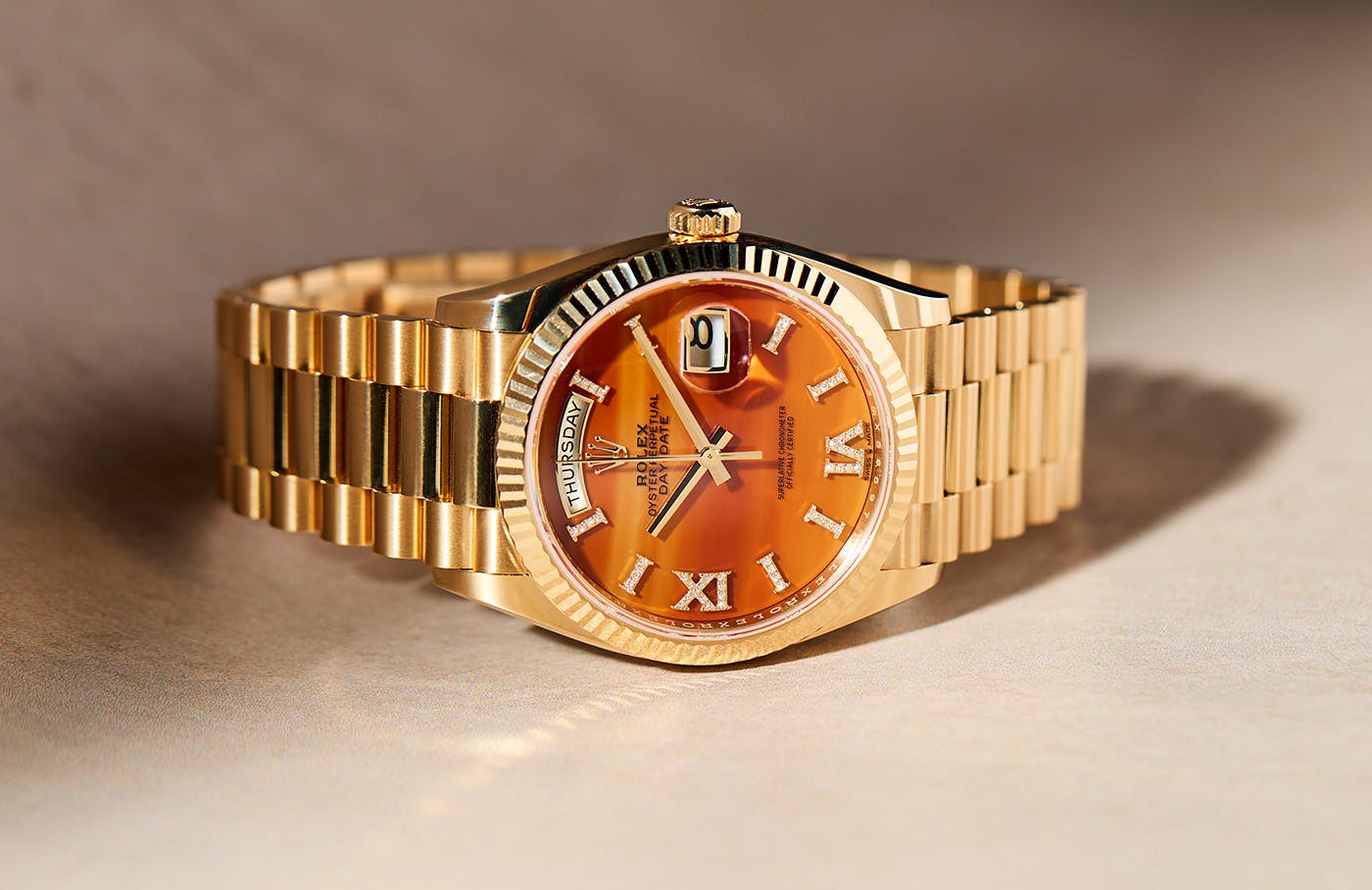 A Rolex Day Date In Yellow Gold With Carnelian Dial WatchBox